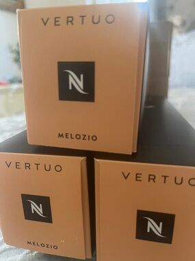 Nespresso Melozio Vertuo Coffee Pods - Tan Packaging with Black Logo